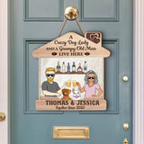 Personalized A Crazy Dog Lady And A Grumpy Old Man Live Here Couple & Dogs Wood Sign Printed PNDT2505