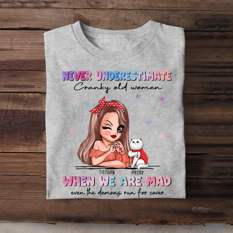 Personalized Cat mom Never Underestimate Cranky Old Women When We Are Mad Even The Demons Run For Cover T-shirt Printed HN24862