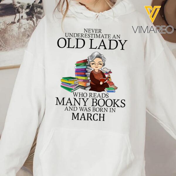 PERSONALIZED NEVER UNDERESTIMATE AN OLD LADY WHO READS MANY BOOKS AND WAS BORN IN MARCH HOODIE TNHC1401