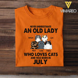 PERSONALIZED NEVER UNDERESTIMATE AN OLD LADY WHO LOVE CATS AND WAS BORN IN JULY TSHIRT QTTQ0504