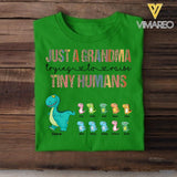 PERSONALIZED JUST A MOM GRANDMA TRYING TO RAISE TINY HUMANS TSHIRT QTVQ2704