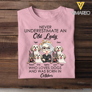 Personalized Never Underestimate An Old Lady Who Loves Dogs And Was Born In October T-shirt Printed QTHN247
